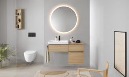 2023_iCon Bathroom with lay-on washbasin, WC wall-hung white matt, Option Mirror Round 90_lights on 1_Big Size