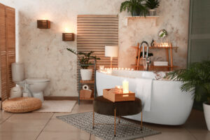Interior_of_modern_bathroom with burning_candles_in_evening_Elements_beige_wood